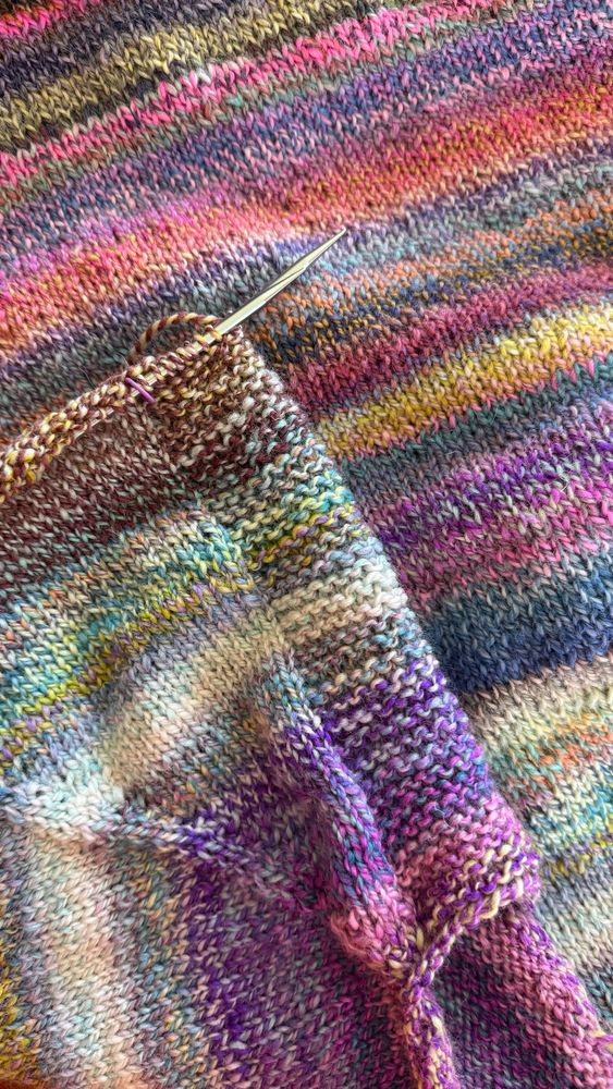 Multi- colored handknit sweater in progress