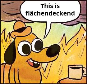 Hund aus dem "This is fine"-Meme, sitzt gemütlich in einem brennenden Raum und sagt "This is flächendeckend"
