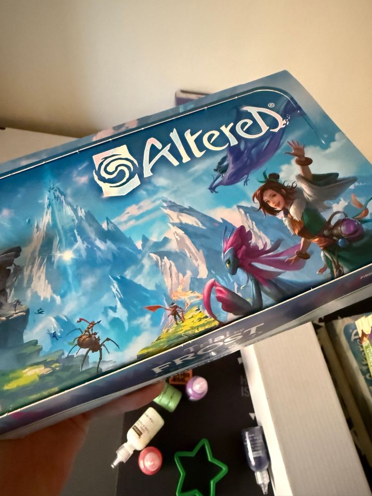 A booster box of the Altered TCG set, Trials of Frost