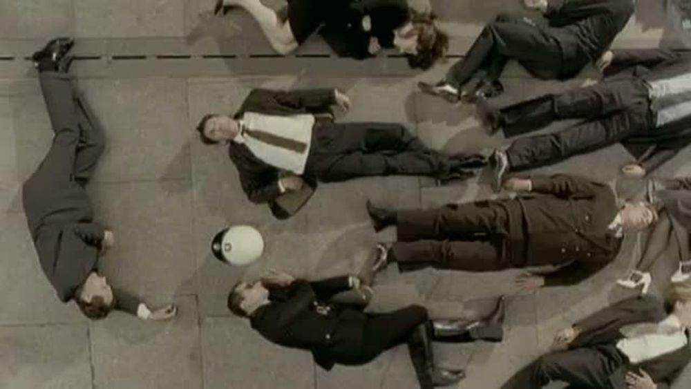 Image of people frozen in terror from “Just” music video 