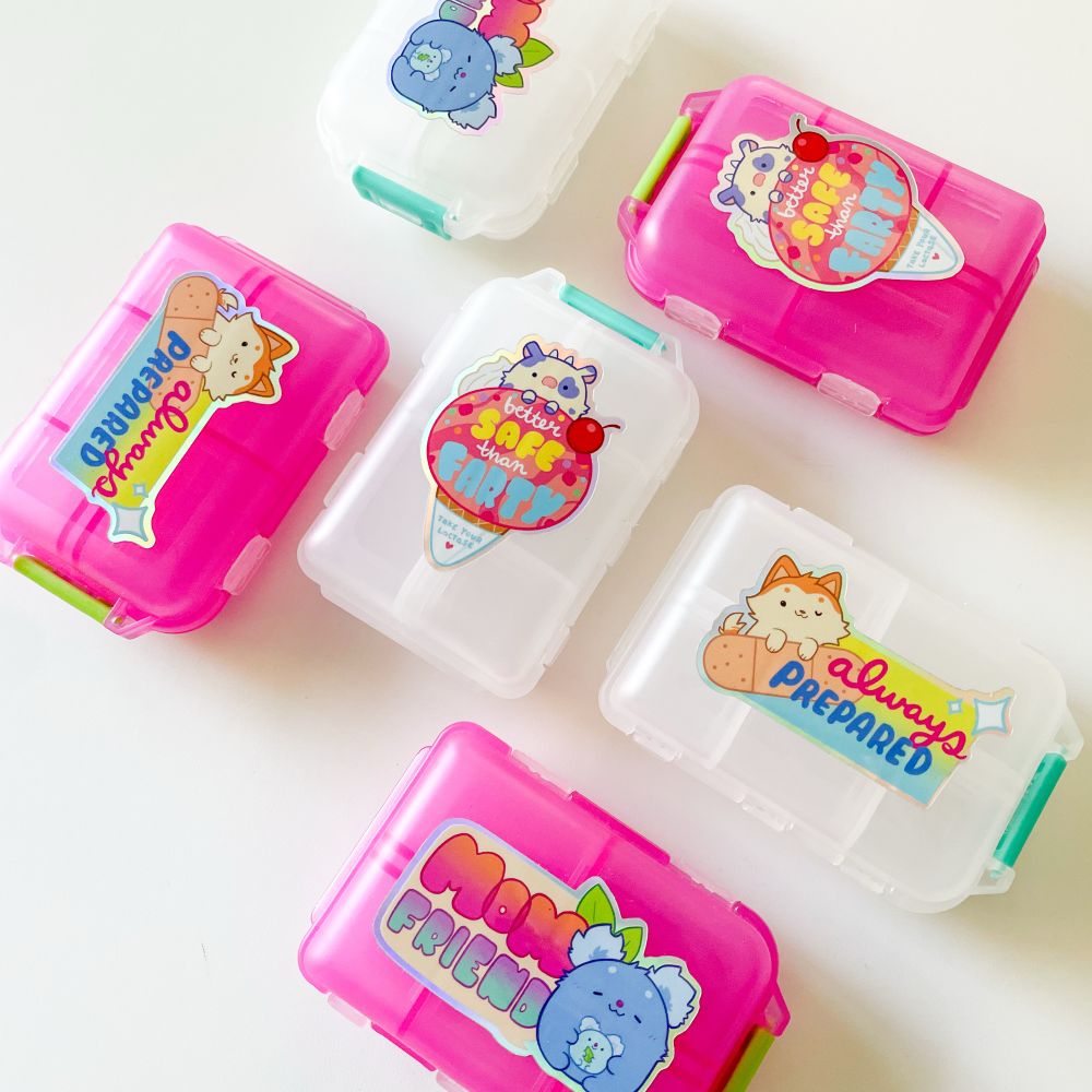 Colorful pill organizers with cute cartoon animals