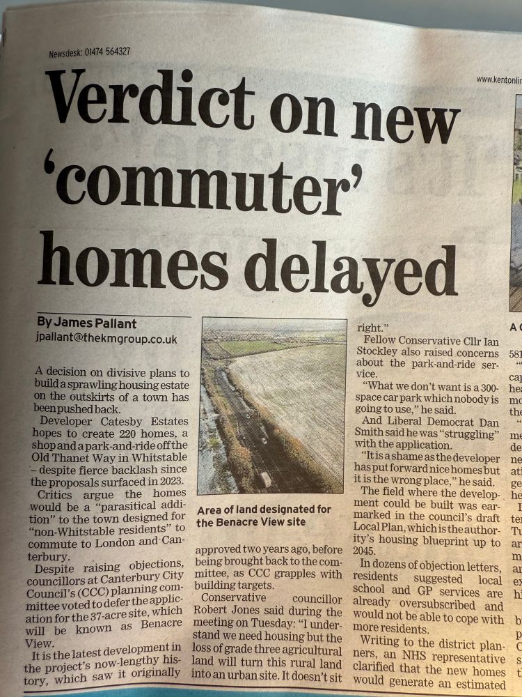 Newspaper clipping showing a long story on a housing estate which is being delayed by planning.
