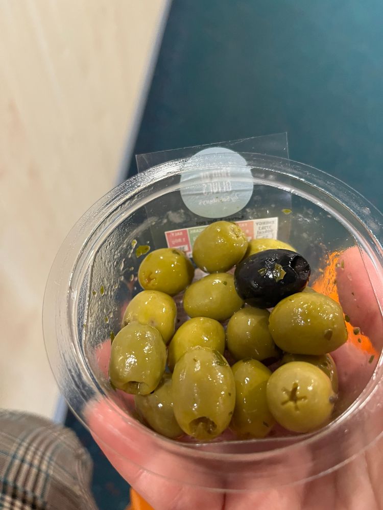 Trio of Olive Pot with one black olive surrounded by green olives