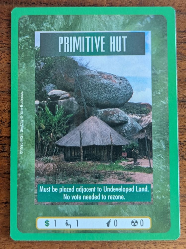 Sim City CCG card "Primitive Hut". It specifies that it's easy to rezone.