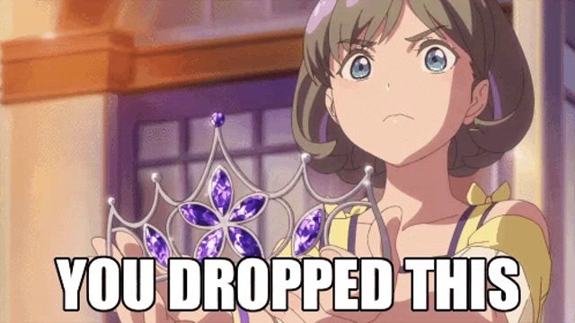 a girl holding a tiara with the words " you dropped this " on the bottom