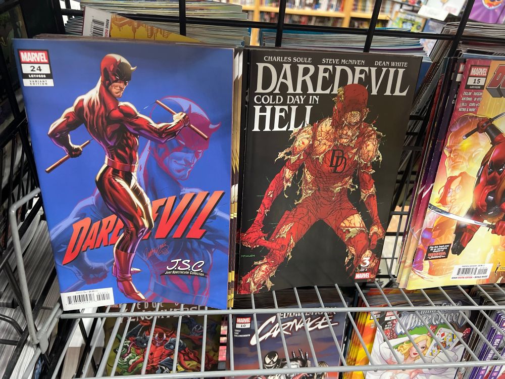 Photo taken at House of Secrets. Daredevil looking like a slut and Daredevil looking like he’s been dragged through hell at least eight times.