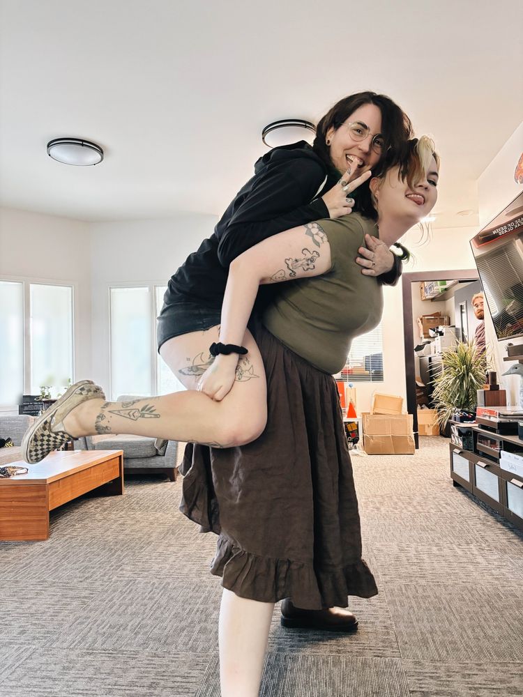 tq on jordynnes back (two femme presenting people)