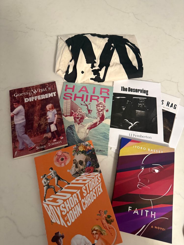 Four books and two magazines published by Malarkey Books plus their t-shirt 