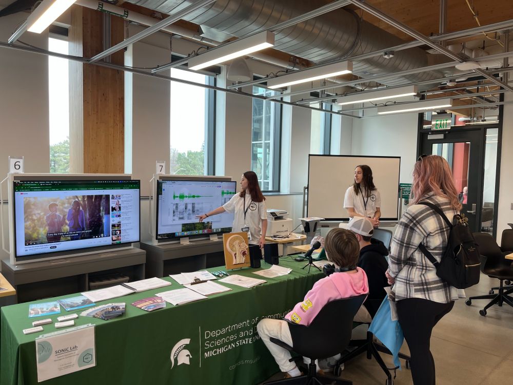participants at the "see your speech " station