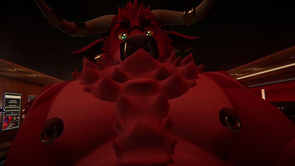 Dev, a red bull furry, topless, with the camera up-close to the his pecs