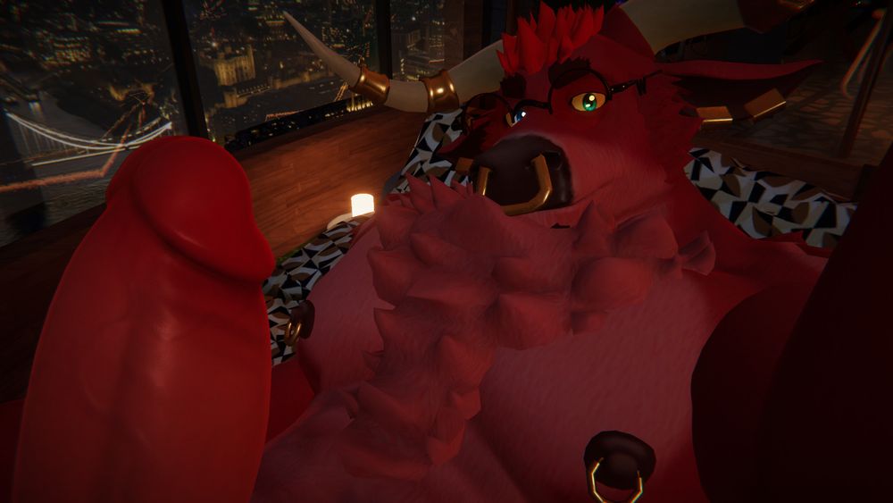 Dev, a red bull furry, taking a selfie, the upper-half of his hard cock in frame