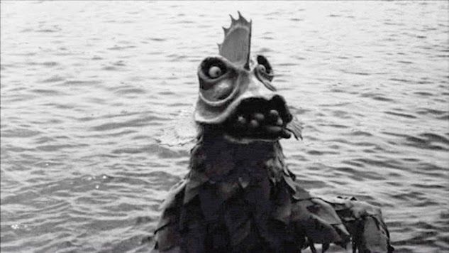 Monster, has a lot of hotdogs stuck in the mouth..