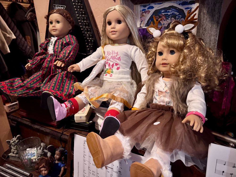 Felicity, Julie, and Courtney (American Girl dolls) in Christmas outfits 