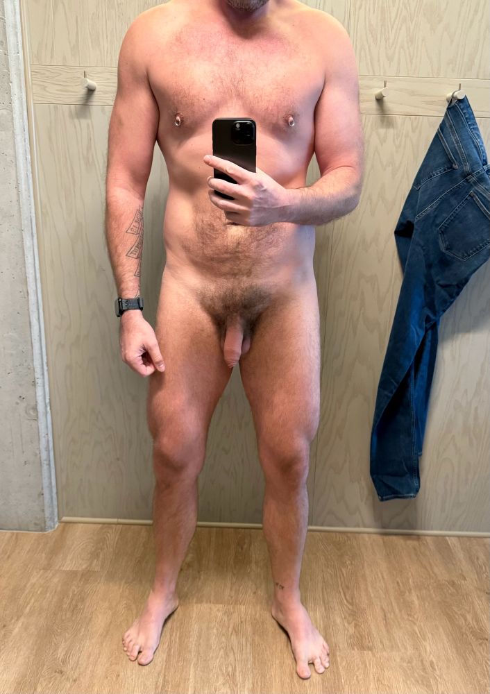 Naked man in a hotel mirror 