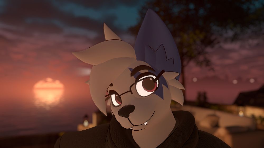 Toshi selfie with a sunset in the background.