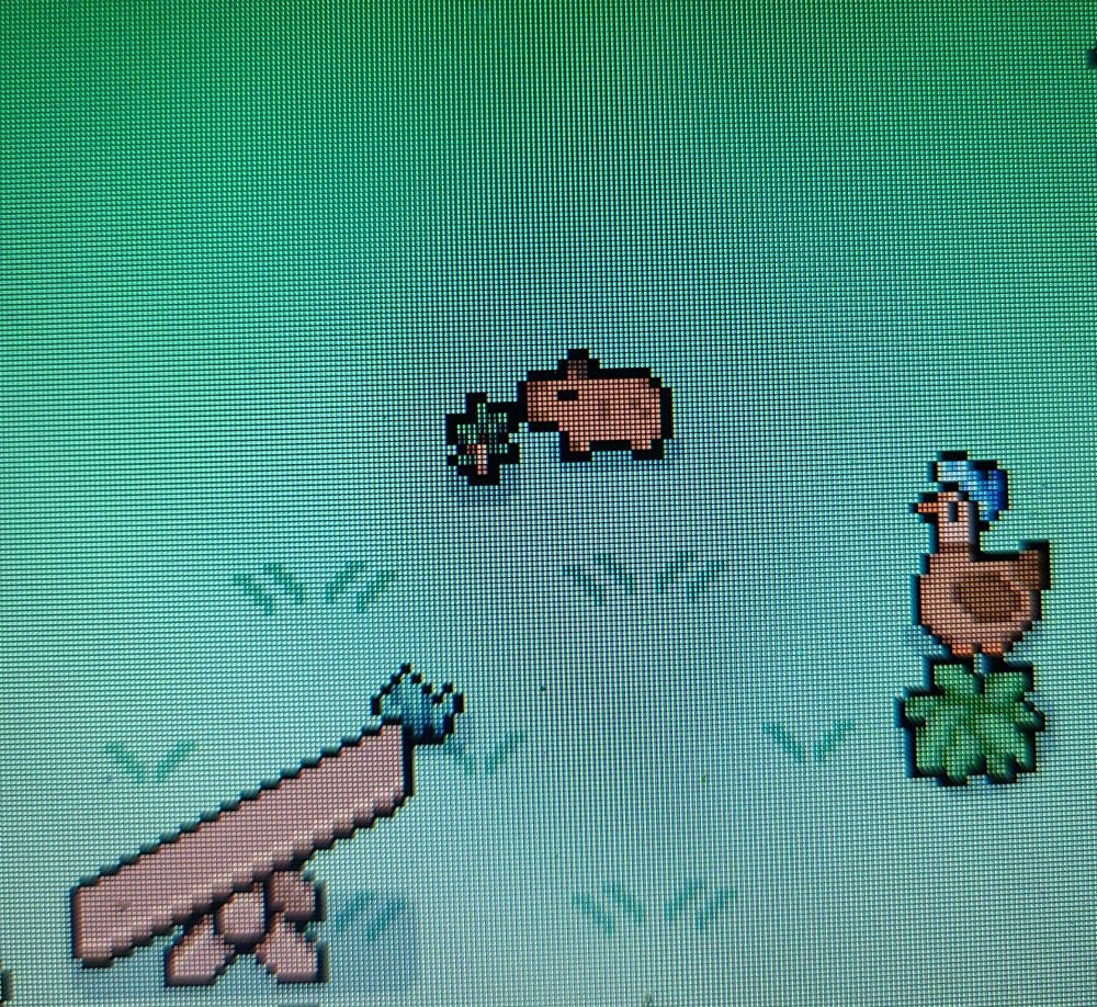 An 8-bit baby capybara munching on grass in the video game "Fields of Mistria."