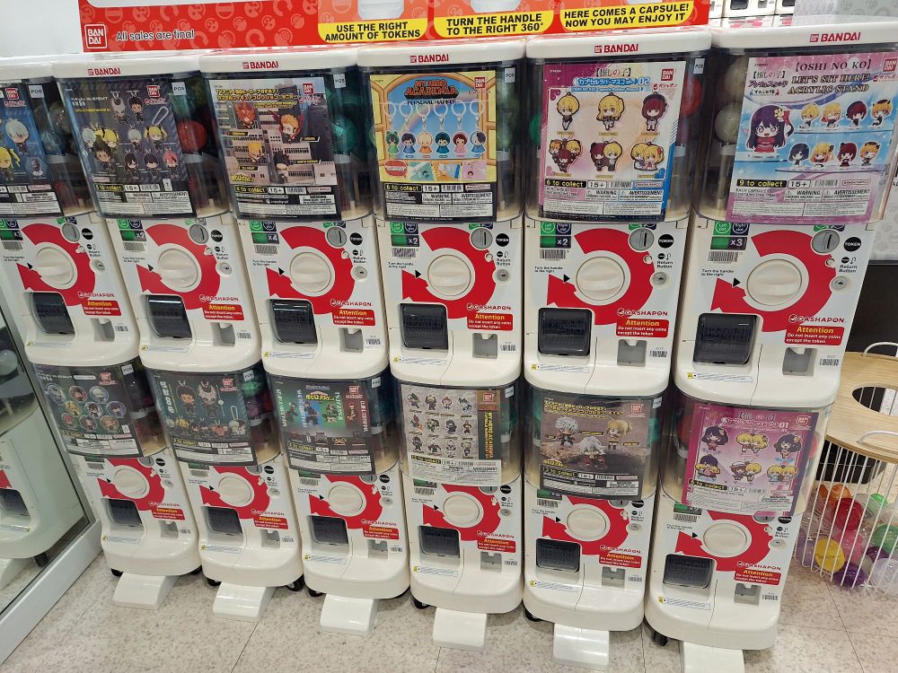A bunch of Bandai gashopon machines