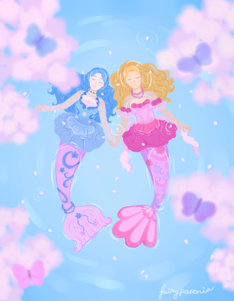 nori and elina from barbie mermaidia holding hands while floating together