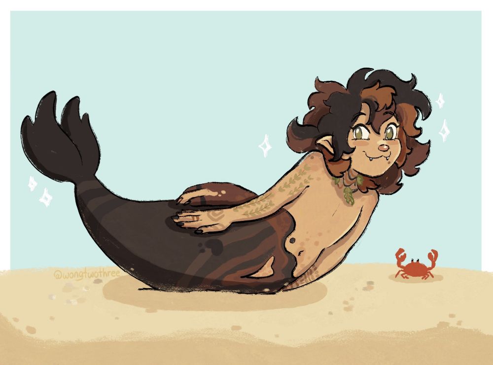 A selkie with brown hair and a brown tail poses in the shape of a banana, much like seals do. A crab looks at him beside him. 