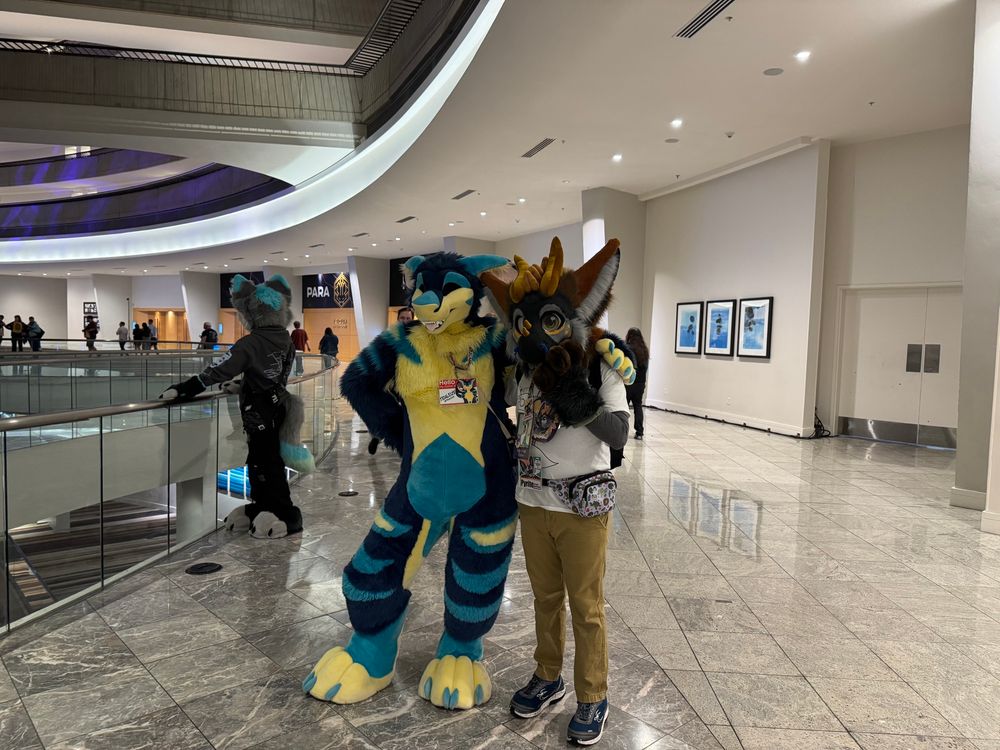 A manokit and dutch angel dragon posing for a photo.