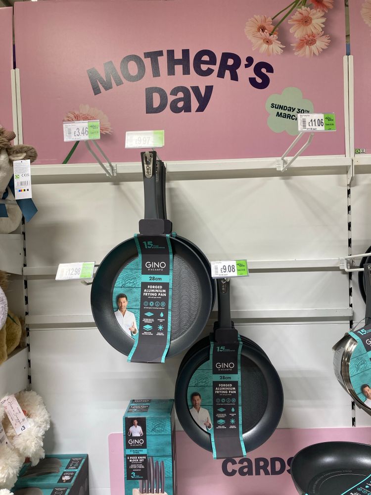an Asda Mothers Day display of Gino D’Acampo frying pans