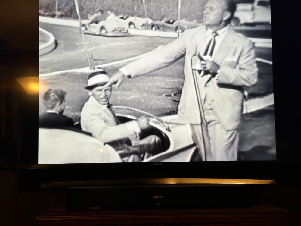 Frank Sinatra with his son Frank Jr. driving an autopia car. 
