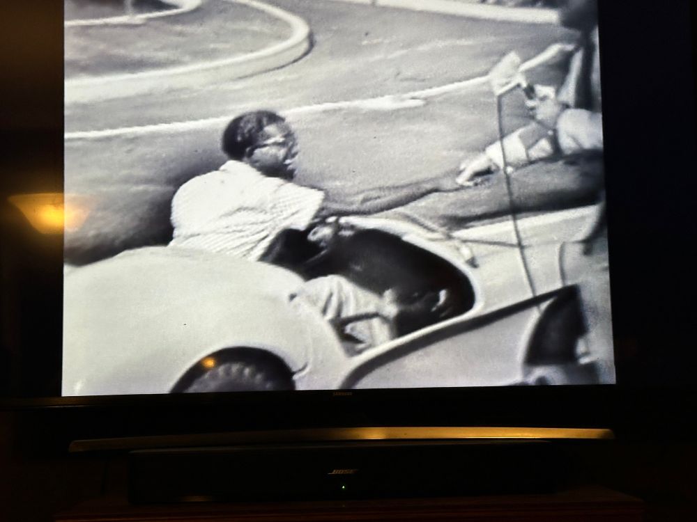 Sammy Davis Jr. driving an autopia car. 
