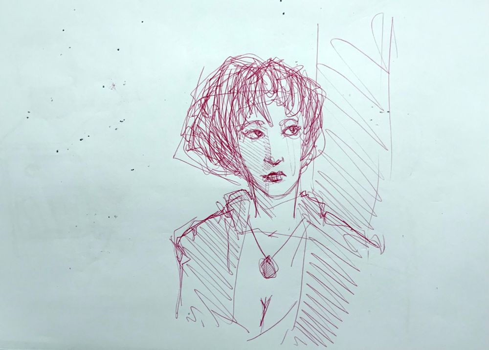 Visage de femme réalisé au stylo bille rouge