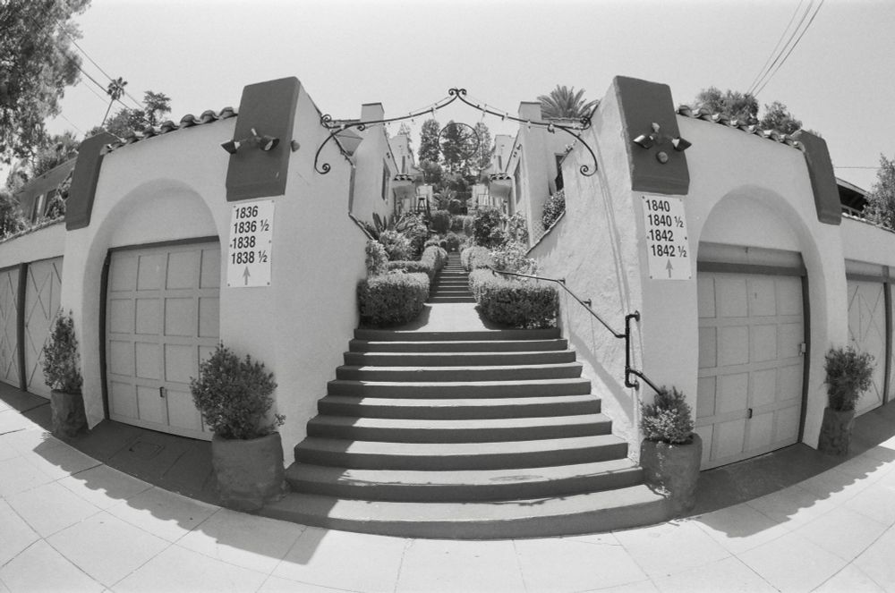 garden staircase flanked by two garages
