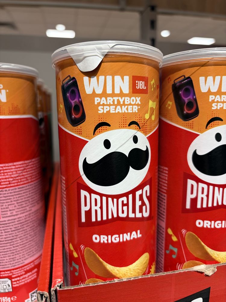 A can of Pringles Original with the text “Win JBL Partybox Speaker” at the top of the design