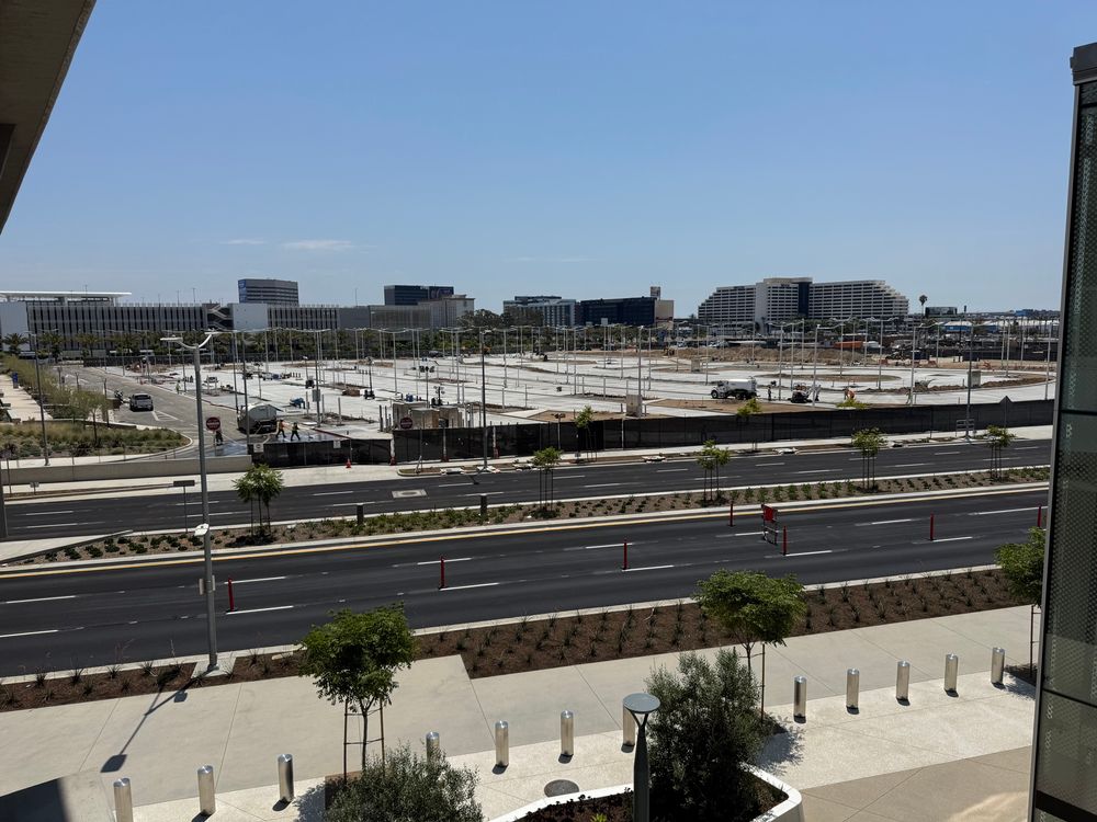 Looking east at the ITF East curbs across Aviation Blvd. 