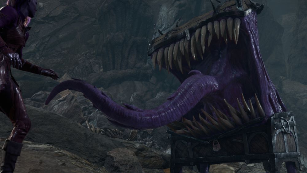 An angry mimic chest, with a giant purple tongue and lots of teeth, lunging towards Lyria.