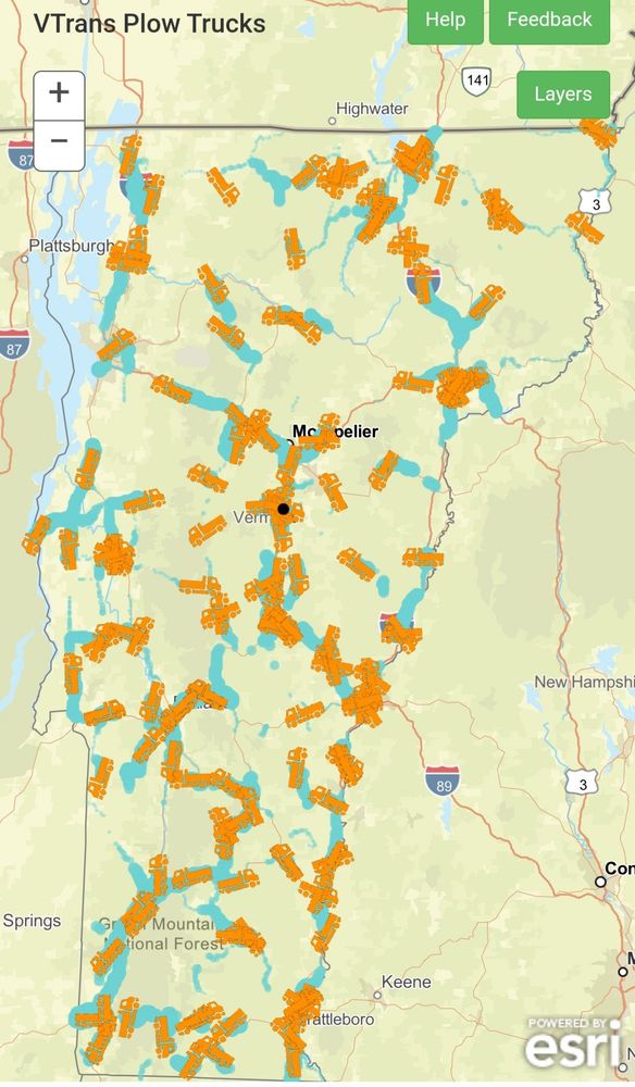Locations of orange icons of snowplows on top of a map of Vermont.