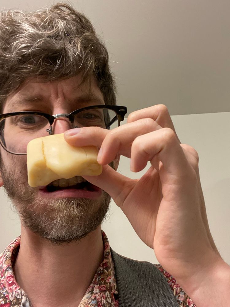 I don’t know what to tell you that isn’t already in the skeet

I am holding a oddly shaped piece of soap up to my nose, it looks like the big honker of the guy from smiling friends 