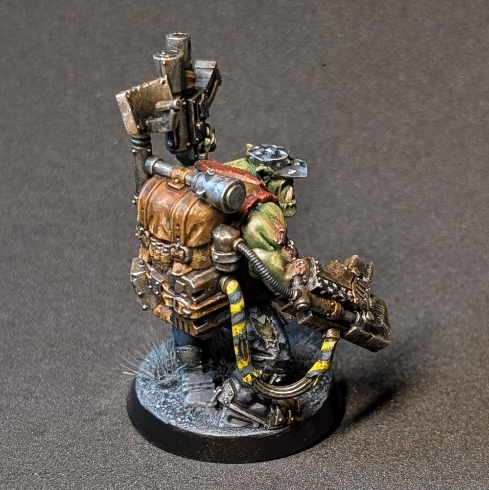 Warhammer 40k kill team Ork with power claw and pistol.  Back view