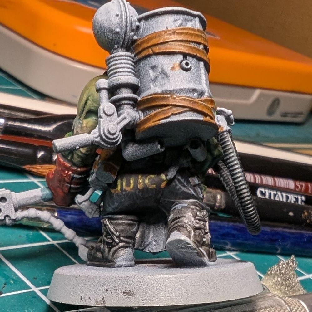 Ork flamer for Warhammer 40k killteam back view with "juicy" written on the back of their pants.
