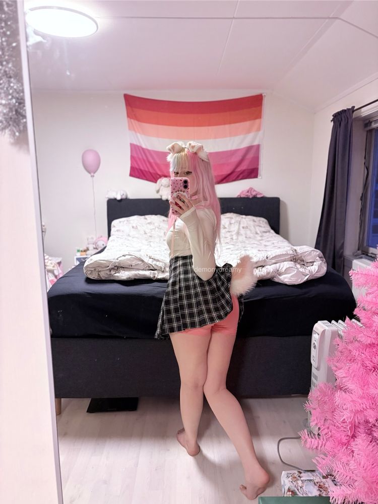 mirror selfie of me from behind, wearing puppy ears and a puppy tail