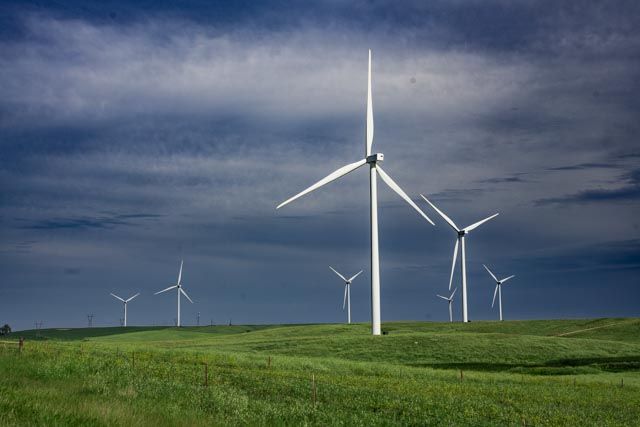 Landscape with windmills just before a storm.