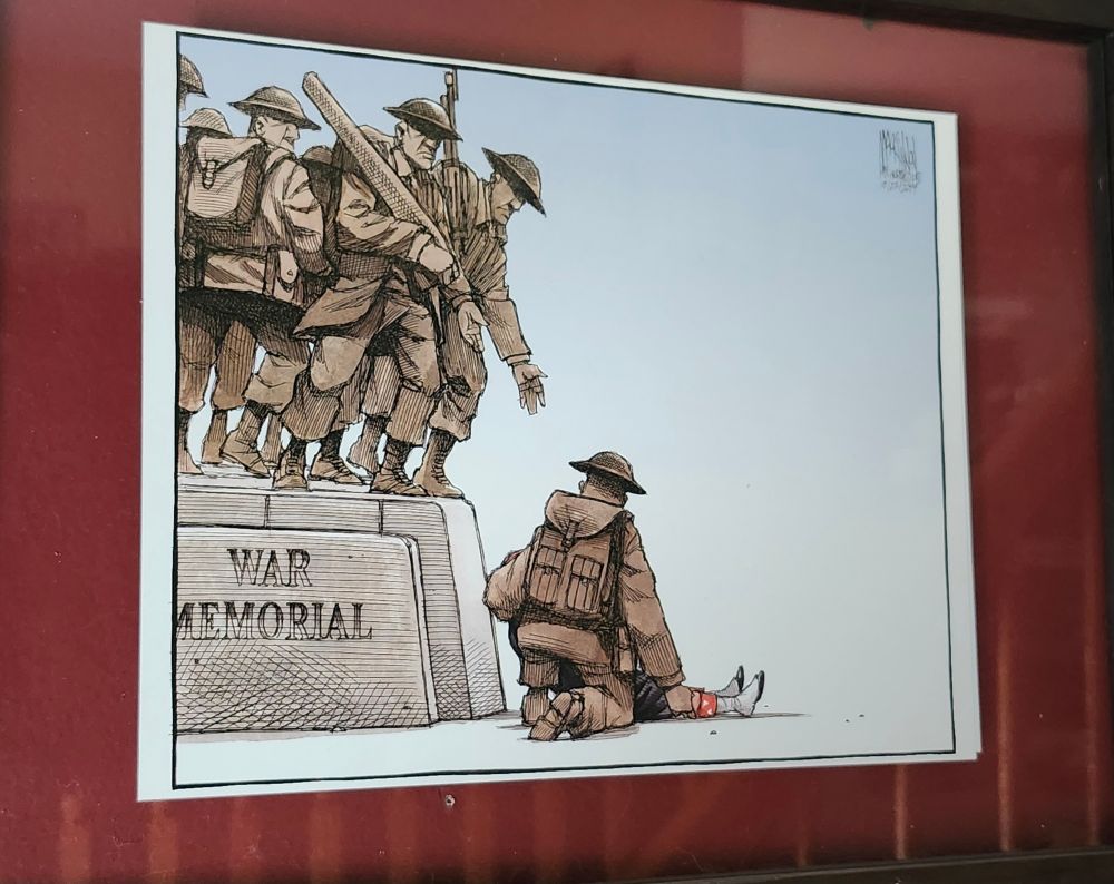 Bruce MacKinnon’s cartoon of Cpl. Nathan Cirillo legs at the base of the National War Memorial with soldiers on the war memorial offering him a hand and one holding the wounded soldier. The cartoon appeared in The Chronicle Herald in 2014. Cirillo was gunned down in October by Michael Zehaf-Bibeau as he stood gaurd over the Tomb of the Unknown Soldier. 