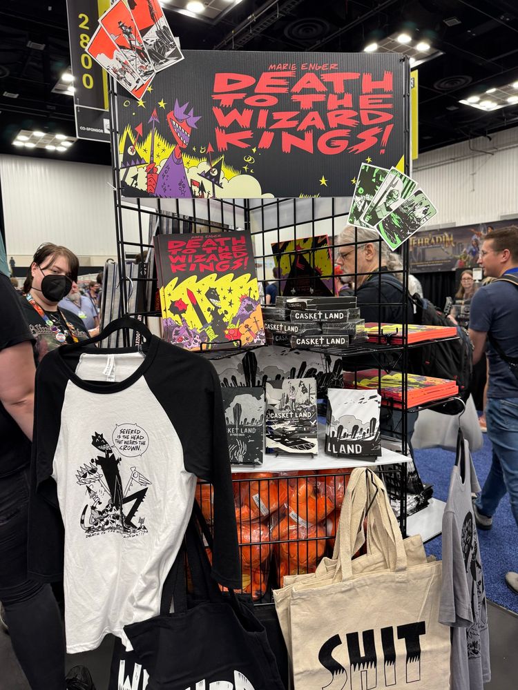 A photo of Marie’s merch at the crwn booth 