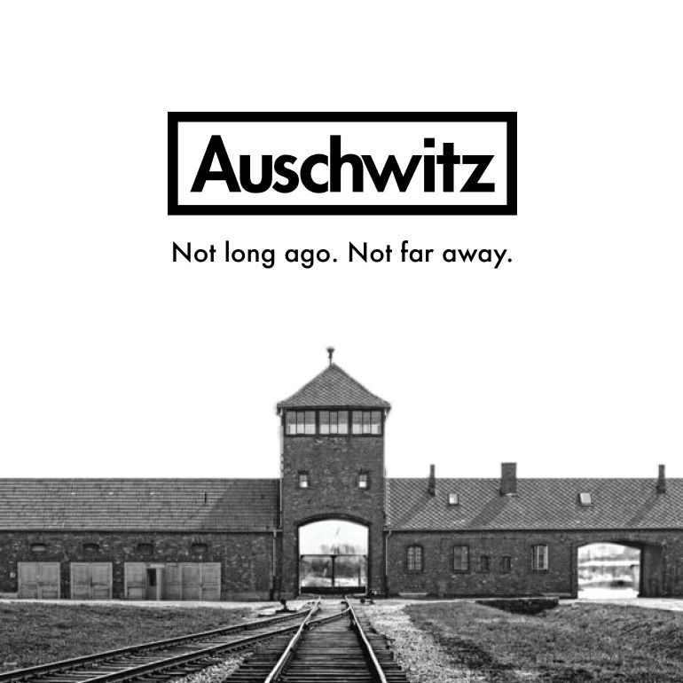 A poster with a b/w picture of Auschwitz, with the text ‘Auschwitz: Not long ago. Not far away’