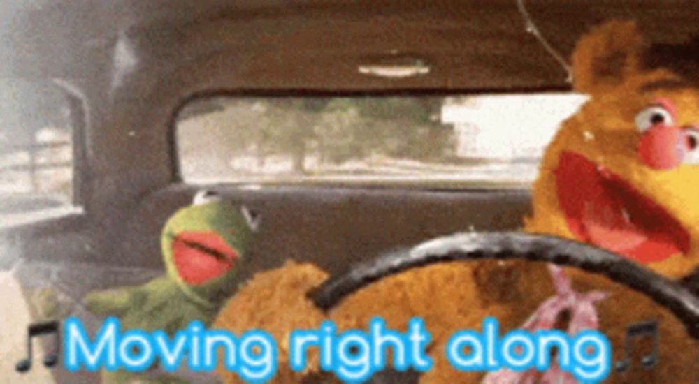 kermit the frog and fozzie bear are driving a car with the words moving right along behind them