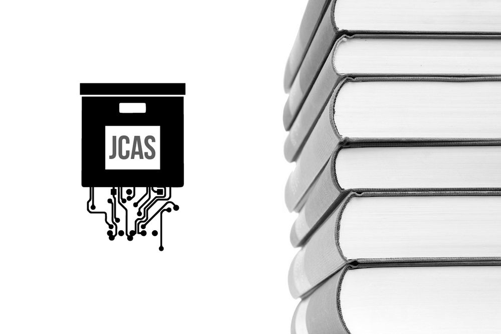 Image contains a stack of books and the JCAS logo