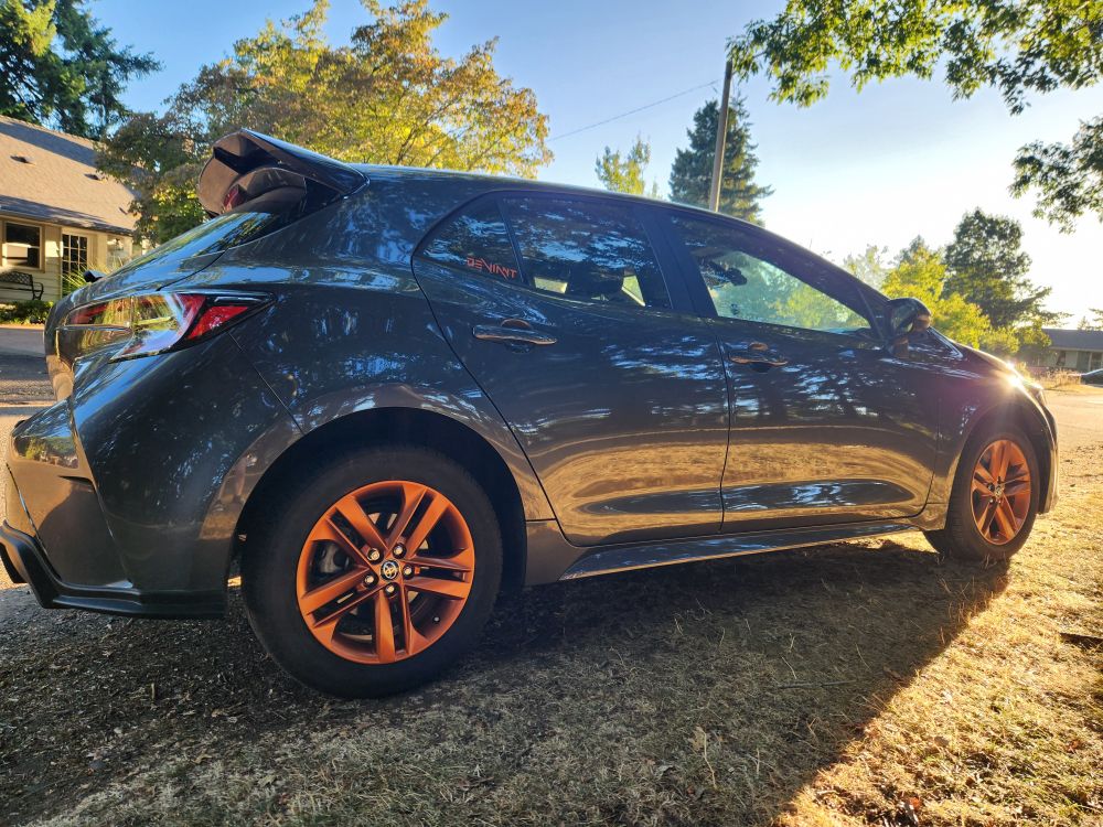 A '22 Corolla Hatchback with Copper painted rims