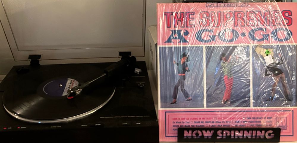 Outer sleeve and spinning vinyl record. The Supremes “The Supremes A' Go-Go”