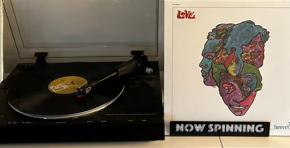 Outer sleeve and spinning vinyl record.  Love “Forever Changes”