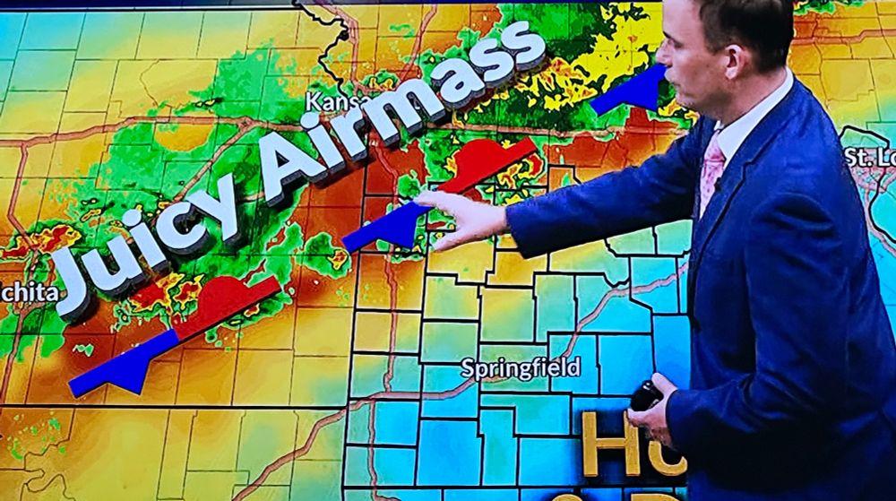 Weather forecaster pointing out a juicy airmass