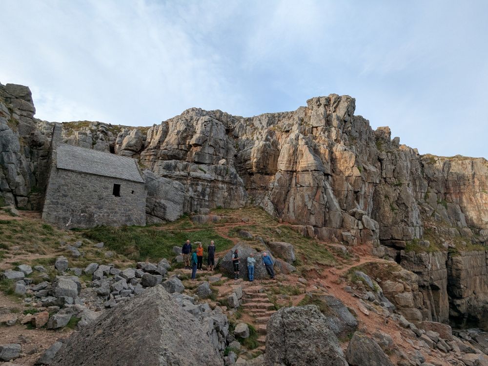 A small chapel built into coastal cliffs 