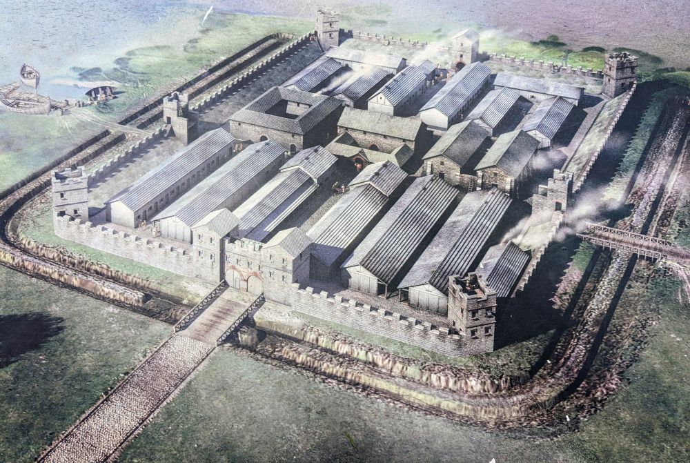 Digital reconstruction of a Roman fort looking rather grey and moody, with boats on lake shore to left 