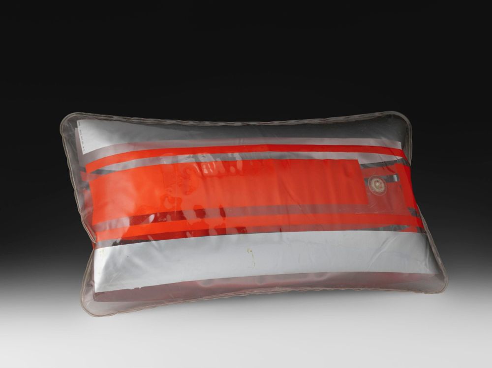 inflatable clear, orange, silver pillow
